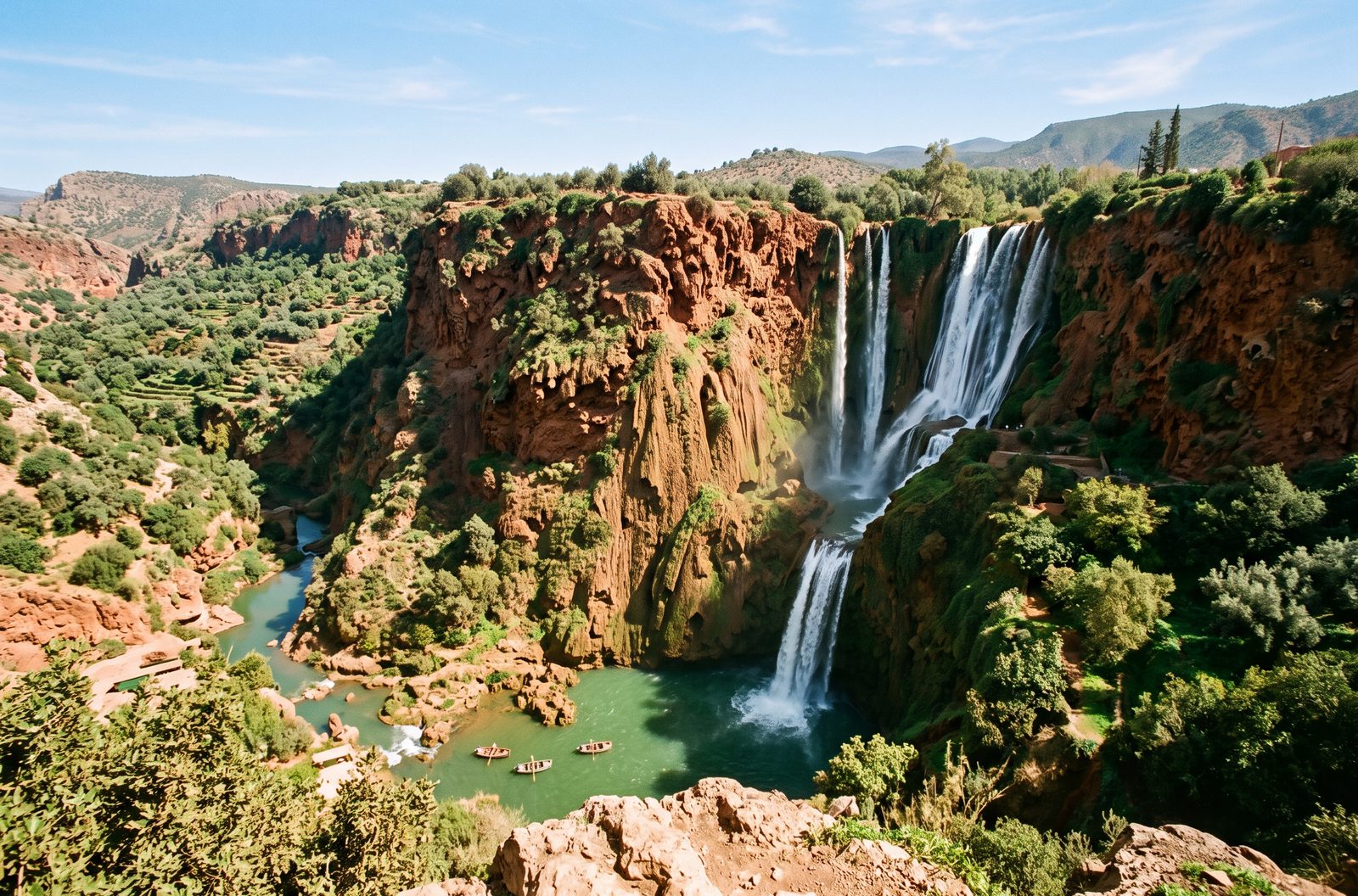 The Ouzoud waterfalls dropping over red rock